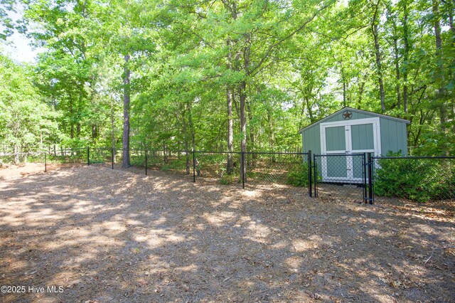 4 Cordelia Way, Vass, NC 28394 - view of yard featuring an outdoor structure, fence, and a shed