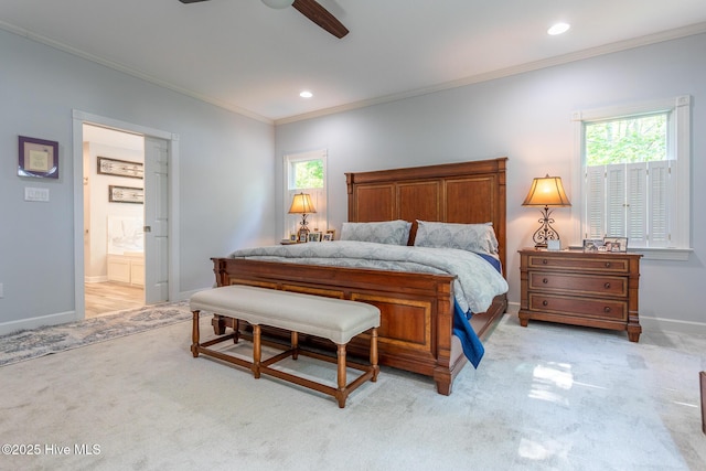bedroom featuring carpet floors, ornamental molding, baseboards, and multiple windows