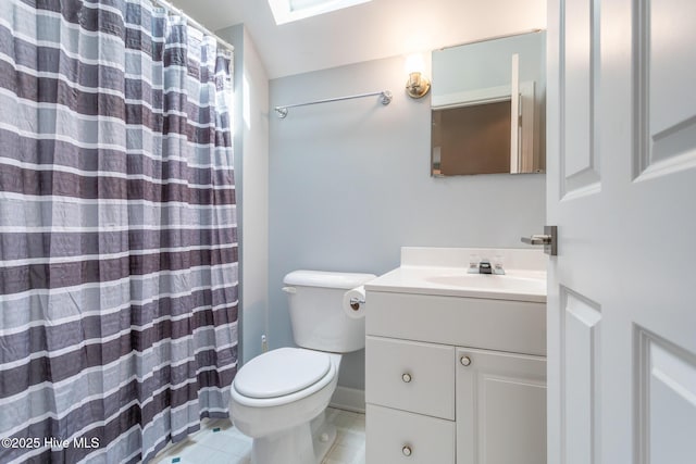 full bathroom featuring vanity, tile patterned flooring, toilet, and curtained shower