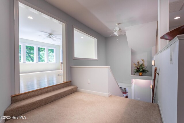 interior space featuring carpet floors, ceiling fan, baseboards, and recessed lighting