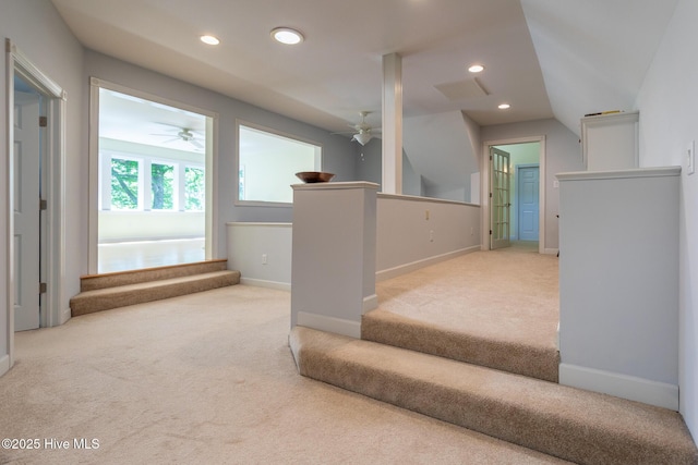 interior space with a ceiling fan, baseboards, recessed lighting, and carpet