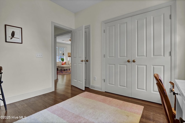 745 Royal Bonnet Dr, Wilmington, NC 28405 - bedroom with baseboards, dark wood-style floors, and a closet