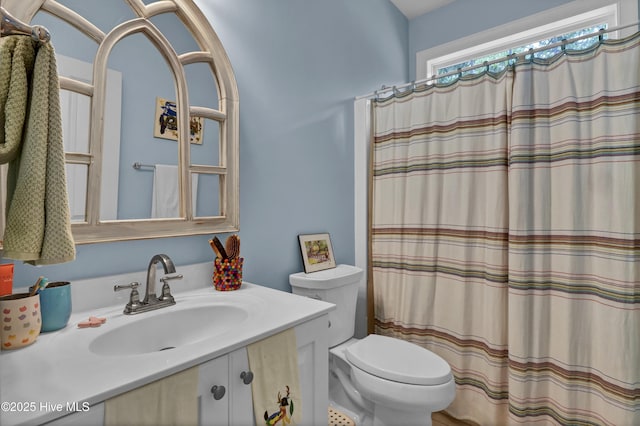 745 Royal Bonnet Dr, Wilmington, NC 28405 - bathroom with vanity, curtained shower, and toilet
