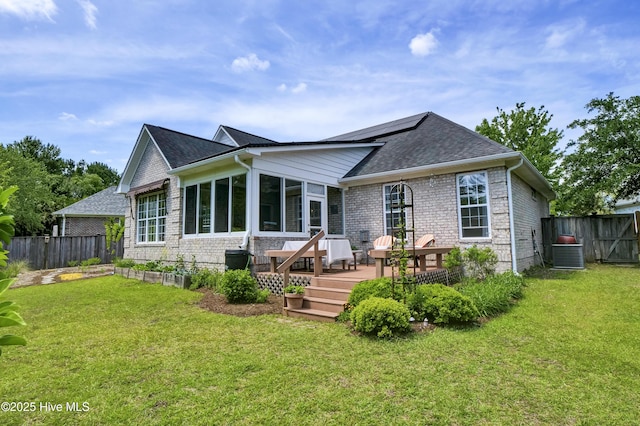 745 Royal Bonnet Dr, Wilmington, NC 28405 - back of house featuring a lawn, a deck, and a fenced backyard
