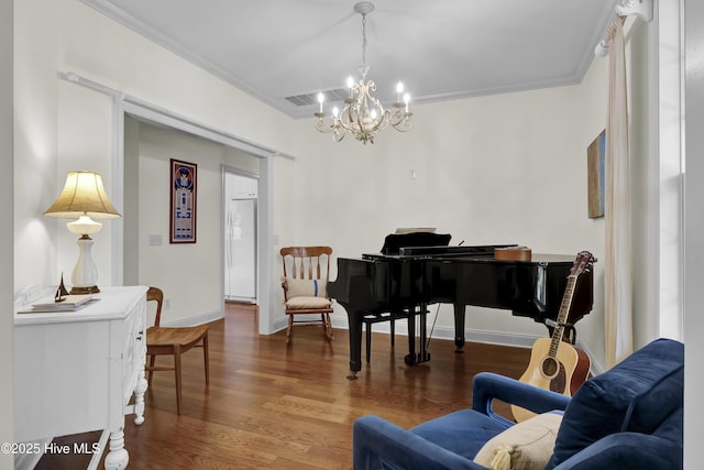 745 Royal Bonnet Dr, Wilmington, NC 28405 - living area featuring an inviting chandelier, ornamental molding, and wood finished floors