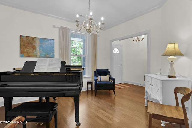 745 Royal Bonnet Dr, Wilmington, NC 28405 - sitting room with crown molding, baseboards, wood finished floors, and a chandelier