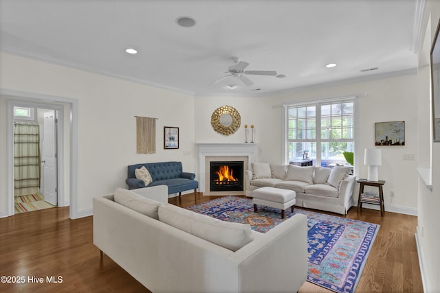 745 Royal Bonnet Dr, Wilmington, NC 28405 - living area with ceiling fan, crown molding, a fireplace, wood finished floors, and baseboards