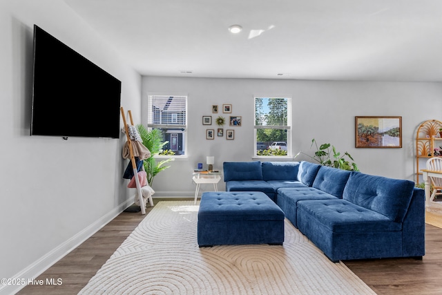4739 Oyster Reef, Wilmington, NC 28405 - living area with baseboards and dark wood-style floors