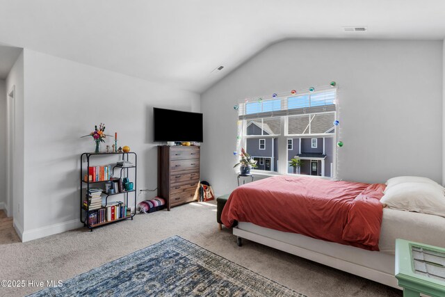 4739 Oyster Reef, Wilmington, NC 28405 - carpeted bedroom with visible vents, baseboards, and vaulted ceiling