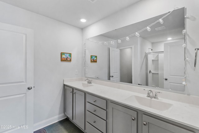 4739 Oyster Reef, Wilmington, NC 28405 - full bath with a sink, baseboards, a stall shower, and double vanity
