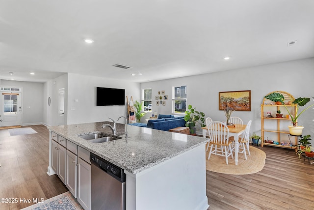 4739 Oyster Reef, Wilmington, NC 28405 - kitchen with a sink, stainless steel dishwasher, wood finished floors, and open floor plan
