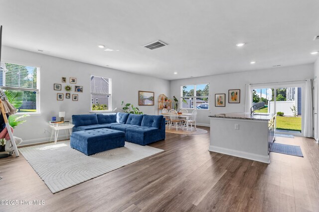 4739 Oyster Reef, Wilmington, NC 28405 - living area with visible vents, recessed lighting, and wood finished floors