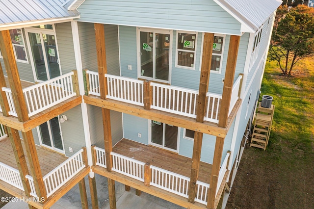 146 Sea Gull Ln, North Topsail Beach, NC 28460 - exterior space featuring central AC unit and stairs