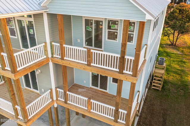 146 Sea Gull Ln, North Topsail Beach, NC 28460 - exterior space featuring central AC unit and stairs