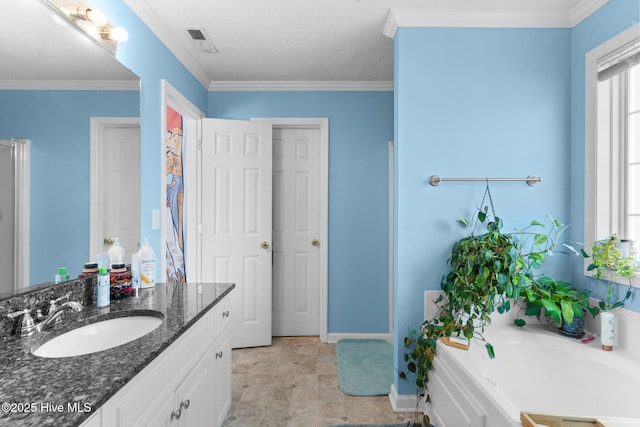 bathroom featuring a bath, visible vents, crown molding, baseboards, and vanity