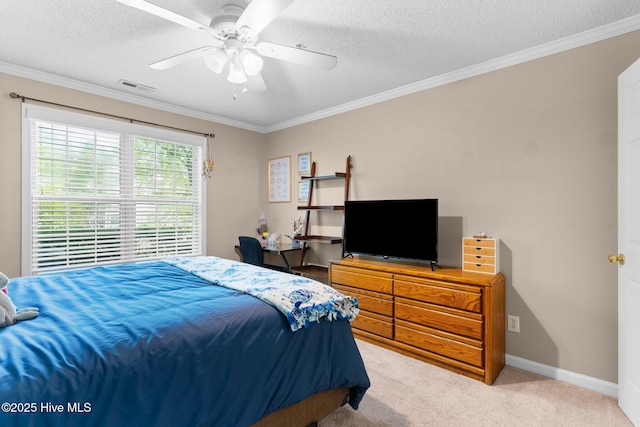 bedroom with a ceiling fan, a textured ceiling, visible vents, carpet floors, and ornamental molding