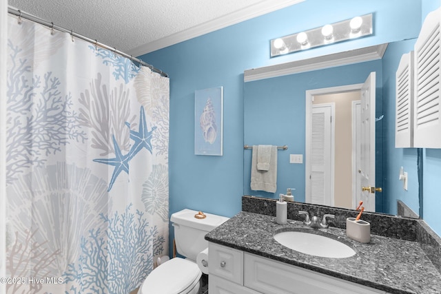 bathroom featuring toilet, a textured ceiling, ornamental molding, and vanity