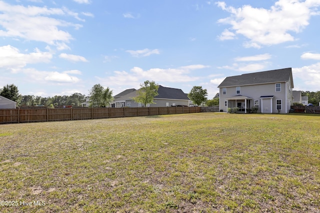 view of yard with fence