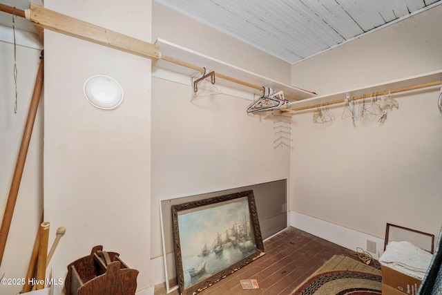 515 E Ridge St, Rose Hill, NC 28458 - spacious closet featuring dark wood-style floors