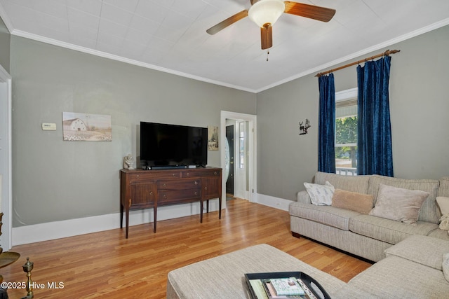 515 E Ridge St, Rose Hill, NC 28458 - living area with light wood-style floors, crown molding, a ceiling fan, and baseboards