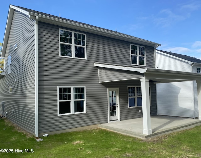 back of house featuring a patio area
