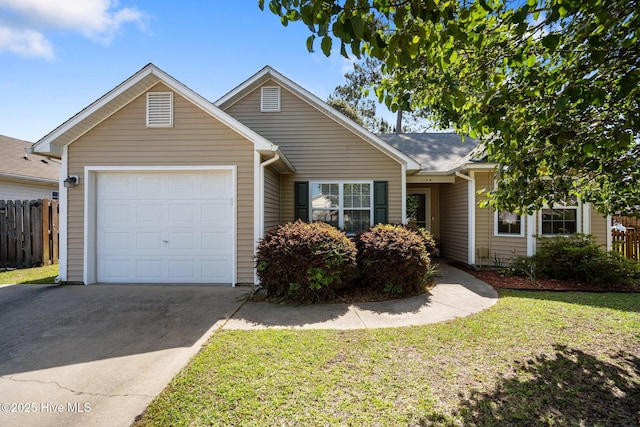 1164 Amber Pines Dr, Leland, NC 28451 - view of front of home featuring a front lawn, driveway, fence, and a garage