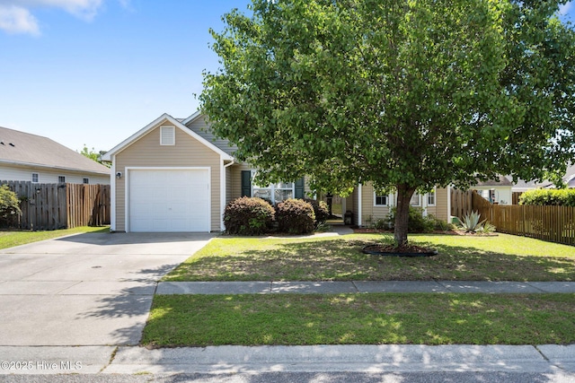 1164 Amber Pines Dr, Leland, NC 28451 - obstructed view of property with a front lawn, driveway, fence, and a garage