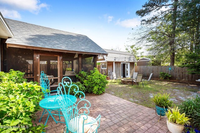 1164 Amber Pines Dr, Leland, NC 28451 - view of patio / terrace featuring a fire pit and a fenced backyard
