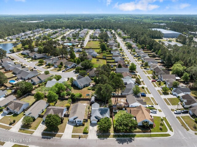 1164 Amber Pines Dr, Leland, NC 28451 - drone / aerial view featuring a view of trees and a residential view