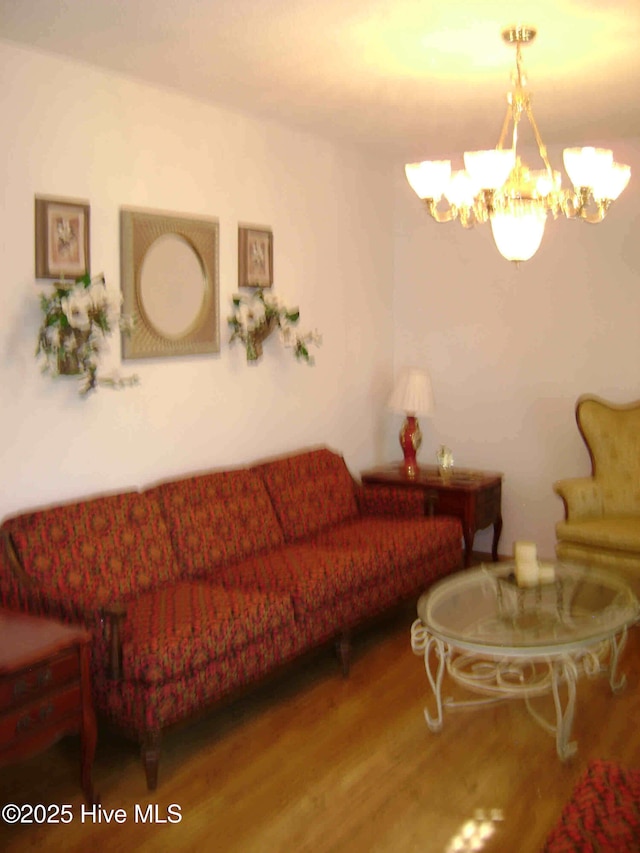 501 US-13, Windsor, NC 27983 - living room featuring a notable chandelier and wood finished floors