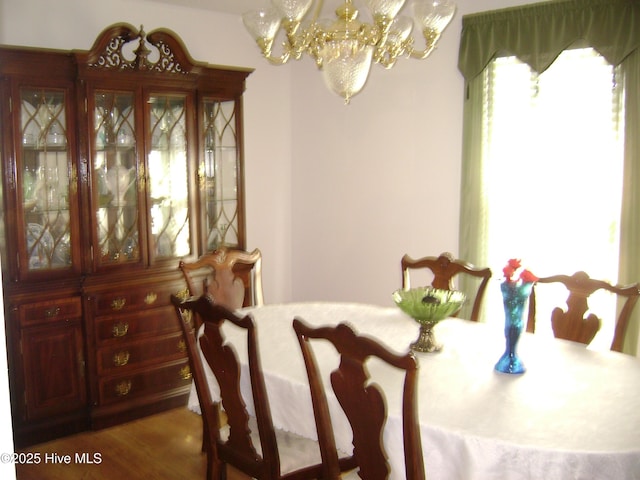 501 US-13, Windsor, NC 27983 - dining room featuring wood finished floors and a chandelier