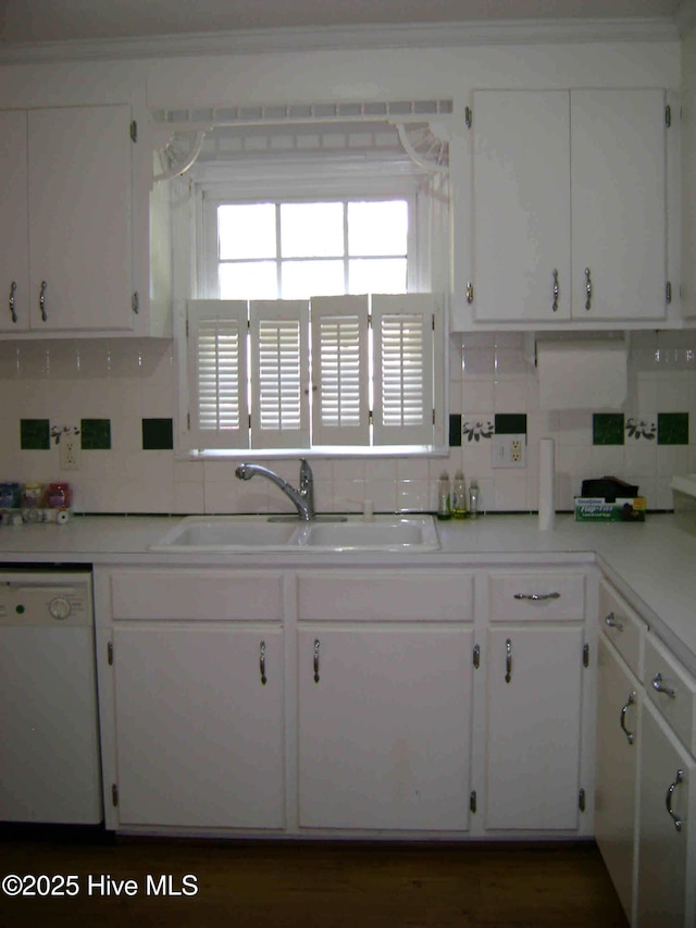 501 US-13, Windsor, NC 27983 - kitchen featuring white cabinets, white dishwasher, and a sink