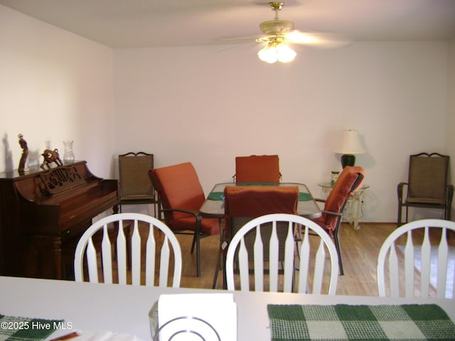501 US-13, Windsor, NC 27983 - dining space featuring ceiling fan and wood finished floors
