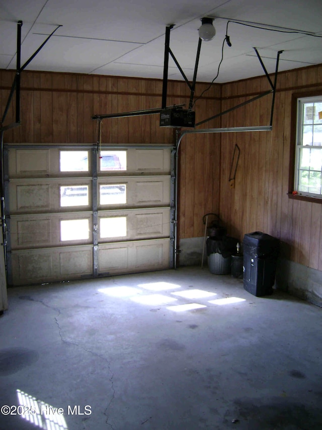 501 US-13, Windsor, NC 27983 - garage featuring wood walls and a garage door opener