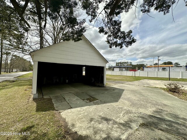 detached garage with fence