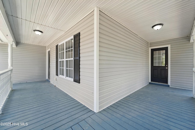 142 Burton Rd, Southport, NC 28461 - wooden deck with a porch