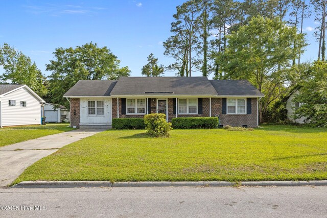 rear view of property with a yard, a deck, and fence