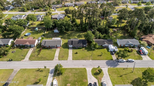 birds eye view of property with a residential view