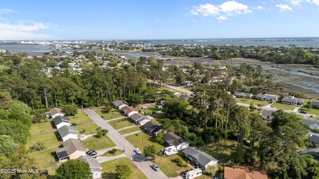 bird's eye view featuring a water view and a residential view