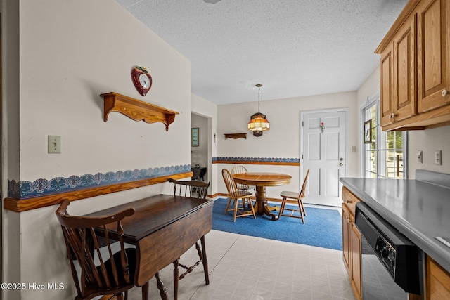 dining area with a textured ceiling