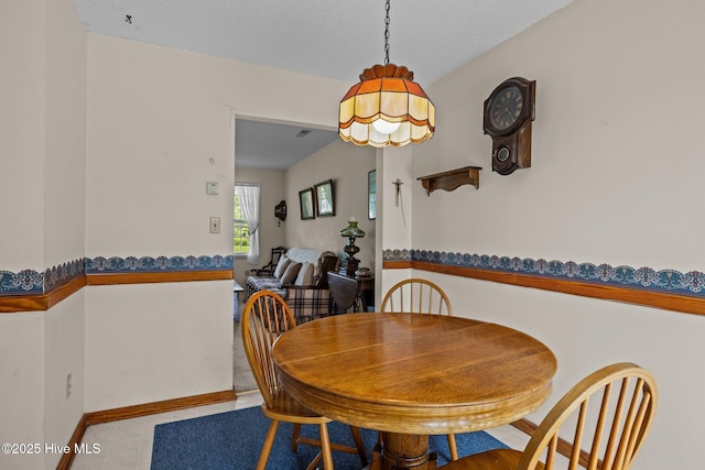 dining area with baseboards