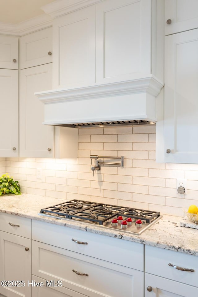118 Dennis Cir W, End, NC 27376 - kitchen featuring white cabinetry, stainless steel gas stovetop, and ornamental molding