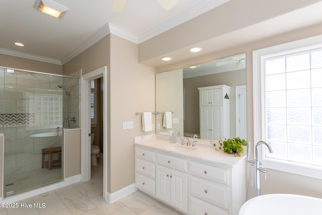 full bathroom featuring vanity, marble finish floor, a ceiling fan, a shower stall, and ornamental molding