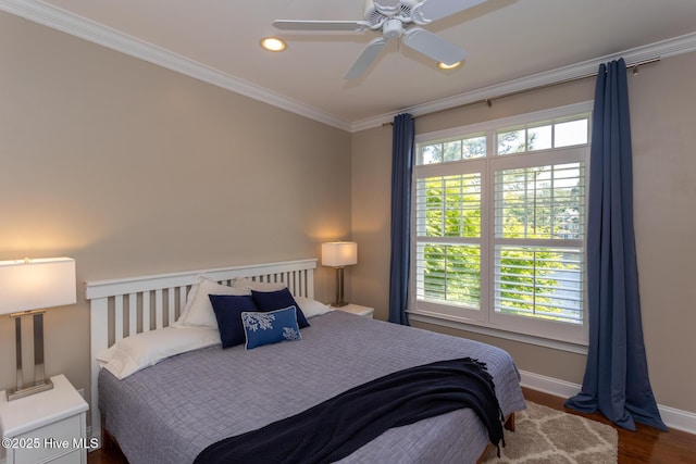 bedroom with crown molding, ceiling fan, recessed lighting, baseboards, and wood finished floors