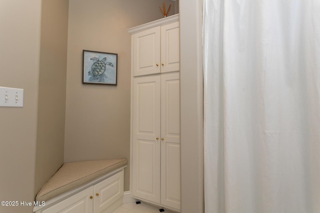 mudroom featuring light tile patterned floors
