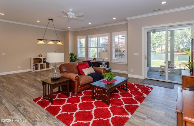 118 Dennis Cir W, End, NC 27376 - living room with wood finished floors, healthy amount of natural light, ceiling fan, baseboards, and recessed lighting