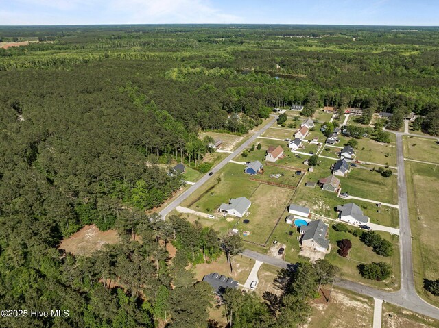 1203 English Colony Pl, Washington, NC 27889 - aerial view of property and surrounding area with a heavily wooded area