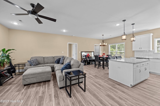 1203 English Colony Pl, Washington, NC 27889 - living area featuring light wood-type flooring, recessed lighting, a chandelier, and a ceiling fan