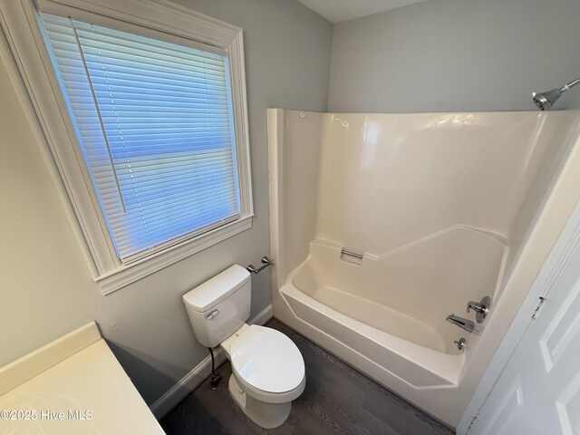 120 Ridgecrest Dr, Mount Olive, NC 28365 - full bath featuring baseboards, toilet, wood finished floors, and  shower combination