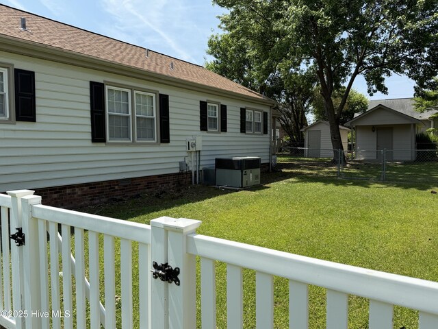 120 Ridgecrest Dr, Mount Olive, NC 28365 - view of yard with cooling unit, a gate, and a fenced backyard